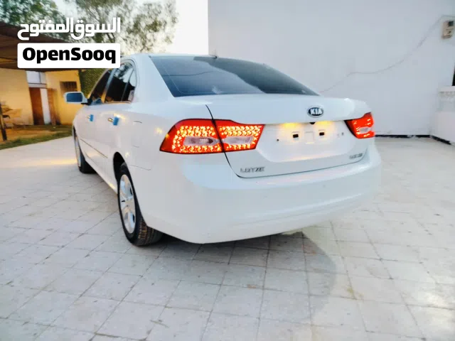 2010 كيا اوبتيما LX