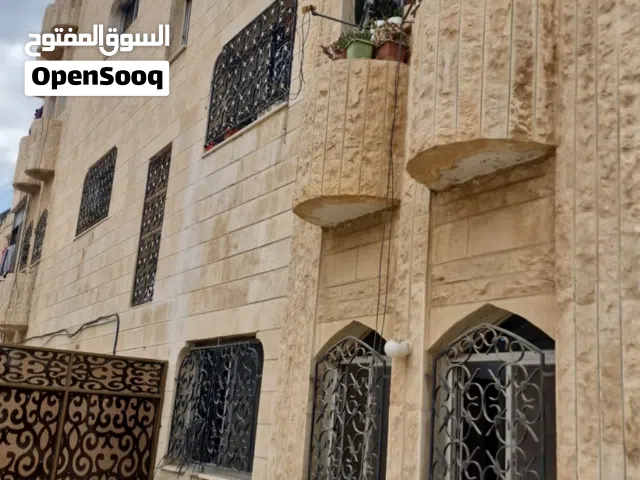 شقة أرضي 4 غرف وحمامين ماركا الونانات قرب صيدلية الينابيع ومدرسة طارق بن زياد