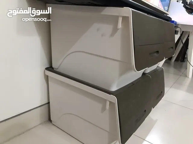 Four Plastic Storage boxes
