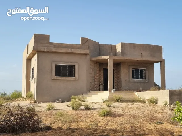 نص هكتار للبيع في اسبيعة بئر علاق يوجد به منزل