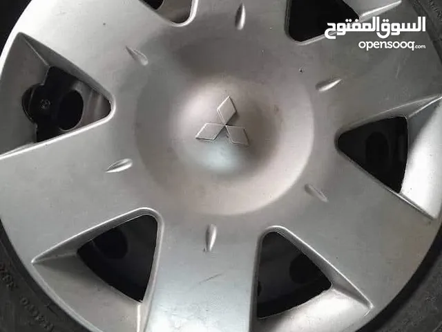 مطلوب غطاء إطار (طاسة) ميتسوبيشي لانسر موديل 2013 مستعمل او جديد
