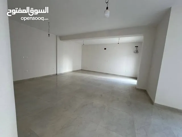 صالة أرضية للايجار في النوفليين رئيسي فرعي موقع ممتاز تتطل على باركن خاص بيها شارع واسع