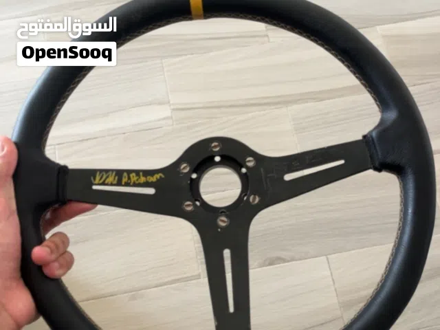 سكان يركب على ستيرنج ويل و يركب على سيارة