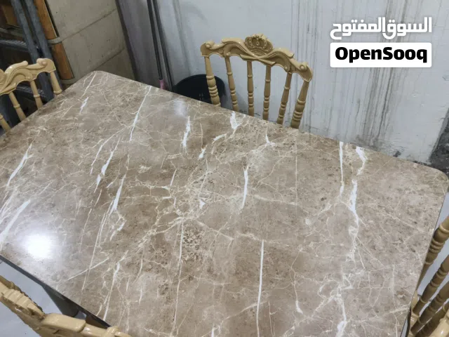 ميز طعام واربع كراسي