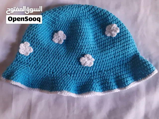 handmade crochet light blue bucket hat with white cloud appliques adult size