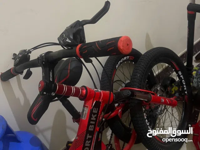 دراجة كهربائيه ودراجة عاديه