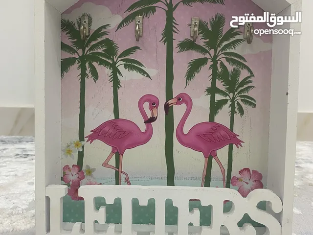 علاقة مفاتيح على شكل رسوم مميزة