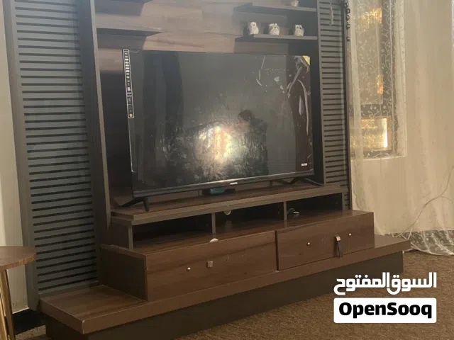 ميز بلازما وغرفة نوم