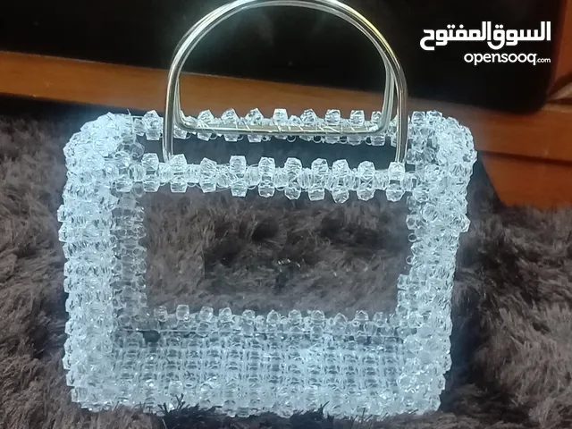 شنط لون فضي