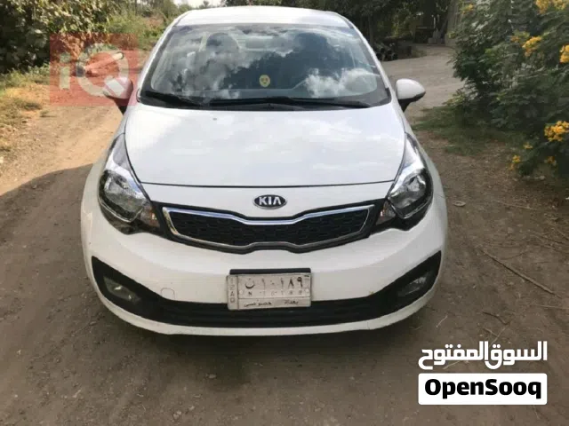 كيا ريو 2014 وارد خليجي سيدان رقم بغداد لون ابيض