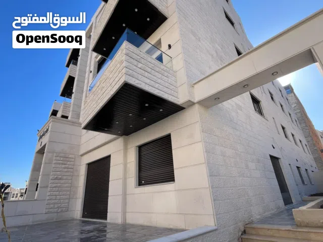 شقة ارضيه مع ترس 100متر في ضاحية الياسمين قرب دوار قرقش