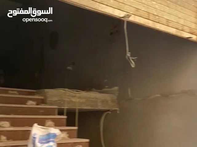 محل دورين 100 متر الدور 50 متر اول تشطيب الزعفران شارع الطوخى ش 12 متر