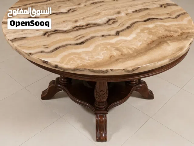 طاولة طعام وسط رخام فخمة جداً - تصميم كلاسيكي راقي بحالة ممتازة