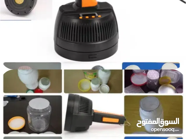 ماكينة كهرومغناطيسية تختيم واغلاق العلب بالقصدير مانع تسرب