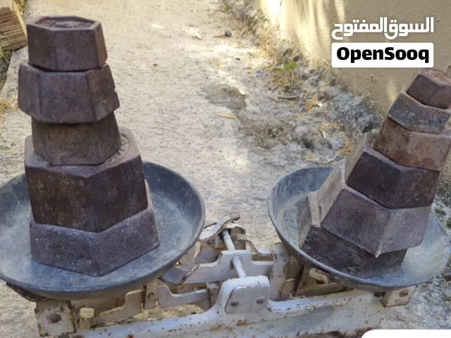 ميزان مع وزنات