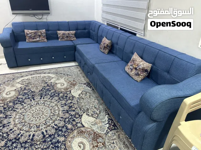 كنب حرف L إلى سبعة أشخاص