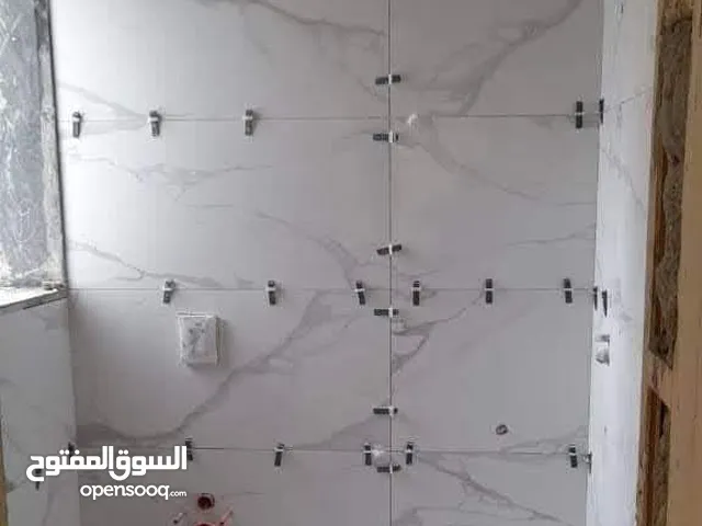 خلفه سيراميك بورسلين مرمر كاشي خلفات لبخ دق مساطر بناء صبغ تجديد بيوت عمل جميع المرمات كادر مصري