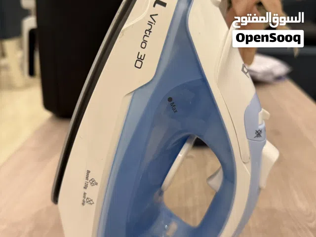 مكواة ملابس - Iron