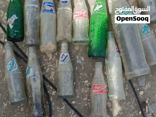 علب زجاجيه بيبسي وكاكاكولا وميرندا قديمه فارغه للبيع