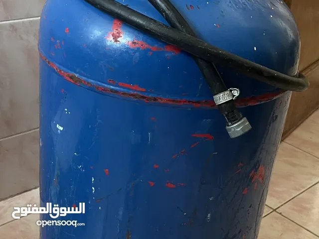 Large gas cylinder with regulator and hose