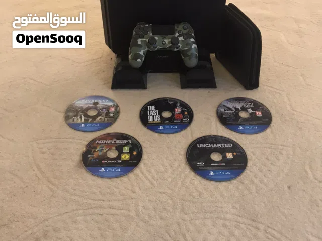PS4 slim with controller and 5 games