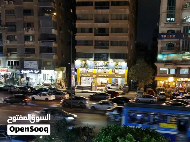فرصة للتمليك والاستثمار  محل تجارى مؤجر بأقوى لوكيشن موقع تجارى متميز على شارع مصطفى النحاس الرئيسى