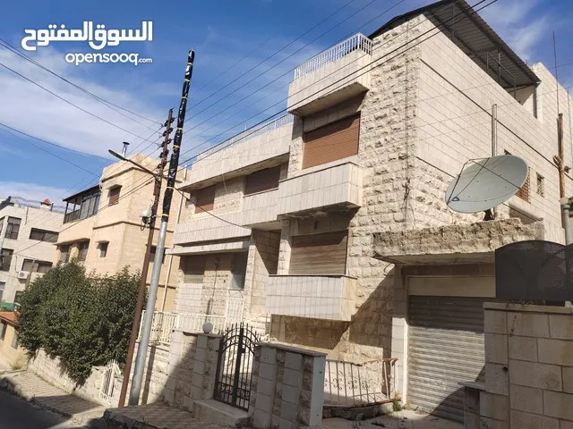 عمارة قديمة 3شقق وروف بموقع مميز بضاحية الرشيد على شارعين للبيع- الرقم المرجعي 14451