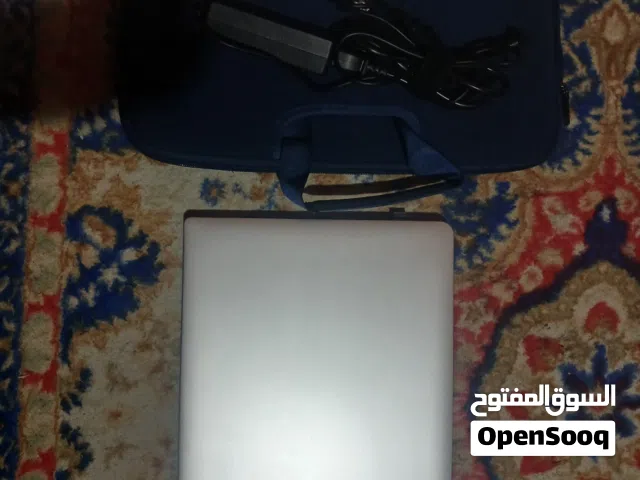 Silver LENOVO Laptop with mouse and bag