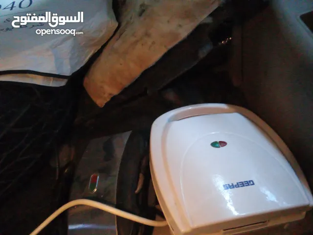 مايكروويف توشيبا شبه جديد توستر للسندويتشات غلاية ماء