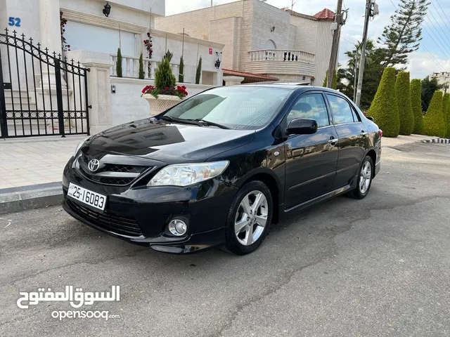 تويوتا كارولا فحص كامل فل كامل مع فتحه للبيع