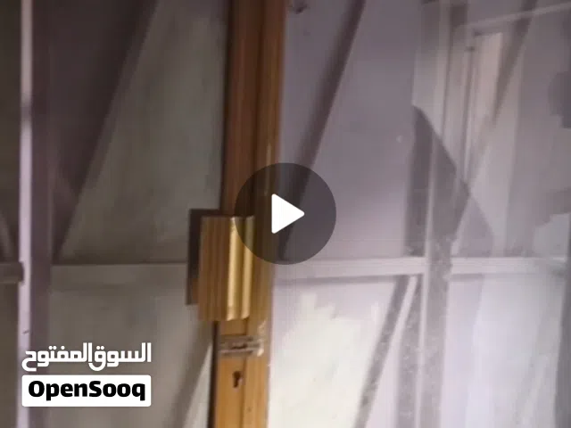 باب حديد ثقيل واجهة محل وباب المنيوم زجاجي بيبان مال محل وعزلنا سعرهن مناسب وبيهن مجال