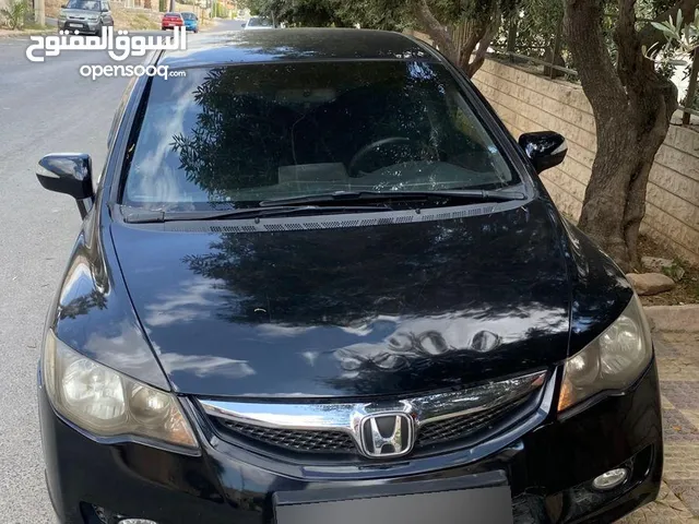 هوندا سيفيك 2009 1300 بانزين و500 هايبرد السيارة منفوضه بلكامل مغيرلها كلشي قابل للتفاوض