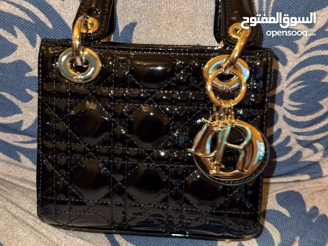 LADY Dior Bag For Sale black patent leather beauitful no defects all ready. Urgent sale needed.