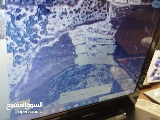 قطعة ارض مميزة باجمل إطلالة في بلعا مزروع زيتون ولوزيات عمر 5سنين