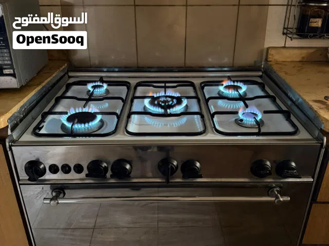غاز وغسالة بحالة جيدة للبيع