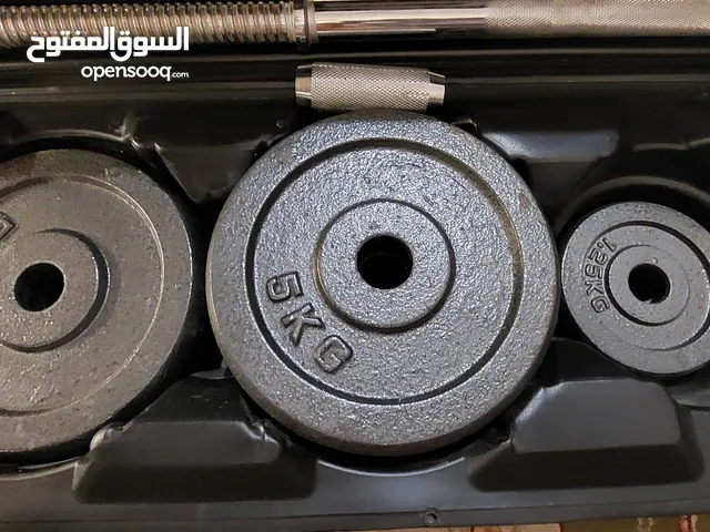 شنطه حديد وزن 50 كجم جديده فيها 2دمبل + 1 بار أوليمبي كبير بيتفك ويتركب جديد للبيع 45 دينار