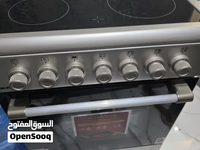غاز كهربائي 4 عيون زجاج