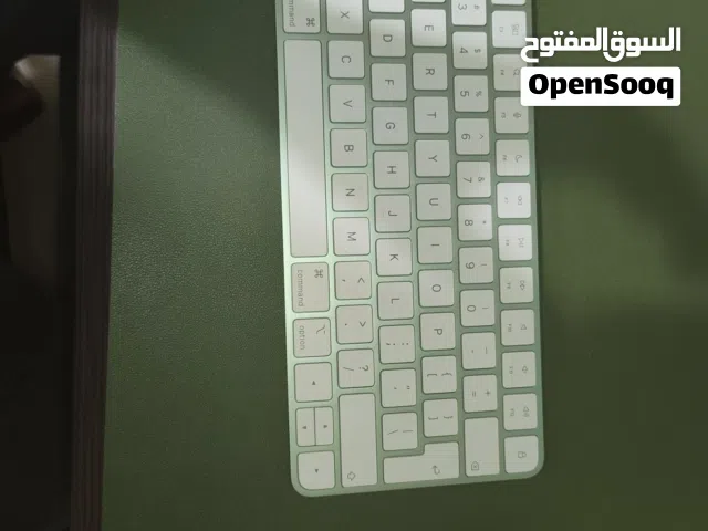magic mouse and keyboard in green
