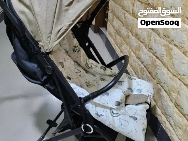 عربة اطفال ماركة جونيور بحالة ممتازة stroller  junior