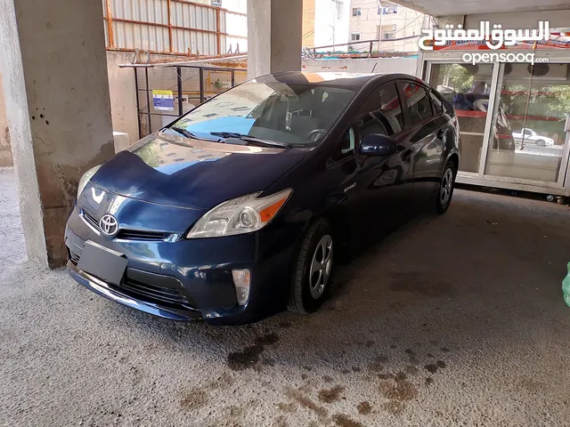 تويوتا بريوس موديل 2013للبيع أو للبدل على قطعة أرض