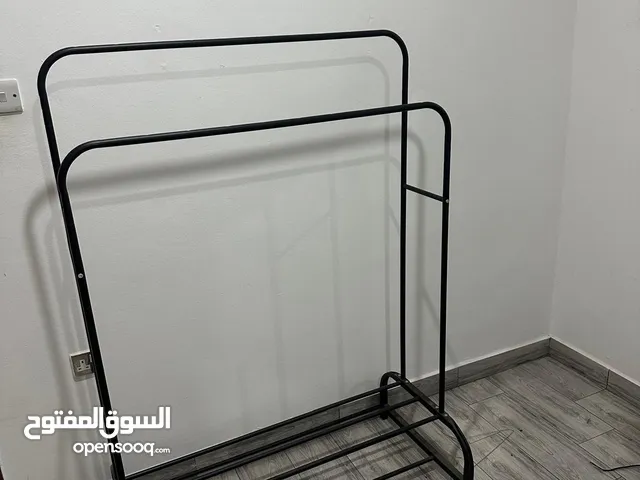 علاقه ملابس واحذيه السعر 5د