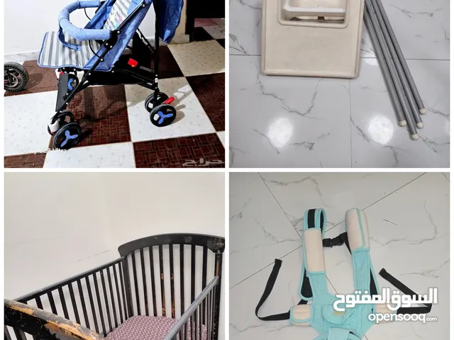 Baby items (bed, Dining chair, baby carrier,Cart.
