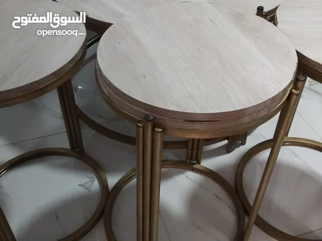 طاوله بيضاويه مع اربع طاولات اصغار