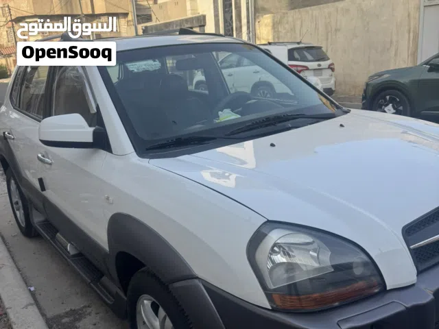 هونداي توكسان 2009 رقم بغداد الجديد السنوية بأسمي محرك 2000 سلايت بيها صبغ قليل مأشر بالصور