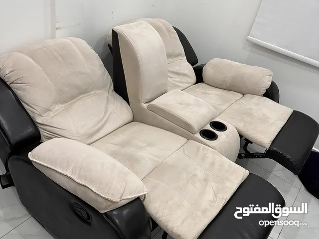 Double recliner sofa in good condition بسعر ممتاز