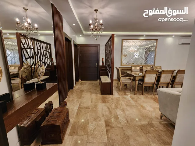 شقة أرضية للبيع على طريق المطار - ref : 14407