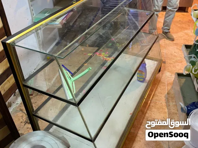 خزانتين و كاونتر مستلزمات بقالة او كافية او محمص