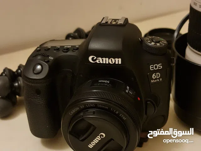 "كاميرا كانون EOS احترافية مع عدستين (50mm + زوم) للبيع"