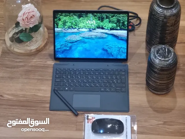 Laptop + Tap (brand / Dell)