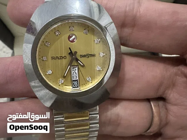 ساعه رادو لون ذهبي
